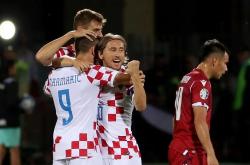 -克罗地亚客场取胜斯洛伐克，保持小组榜首位置